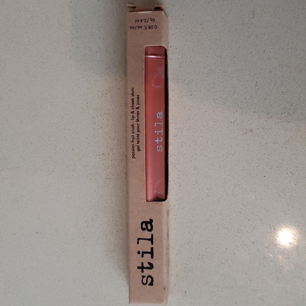 Stila Lip Gloss/Lip and Cheek Stain. Color- Passion Fruit Crush